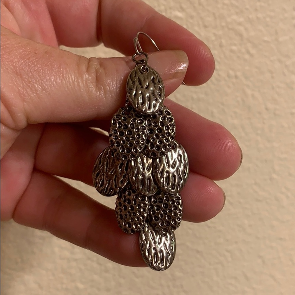 Silver colored dangling earrings